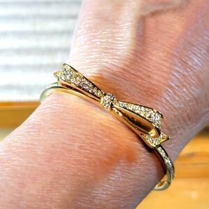 Kate Spade New York Bracelet Gold Tone and Rhinestone Hinged Bow Bangle Bracelet